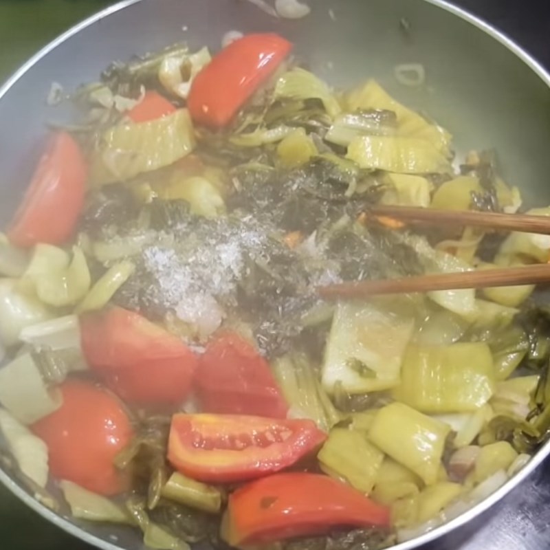 Step 4 Cooking sour hotpot and finishing Sour carp hotpot