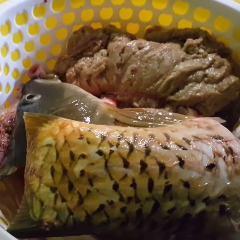 Step 1 Prepare the carp for Carp Hot Pot with Pickled Vegetables