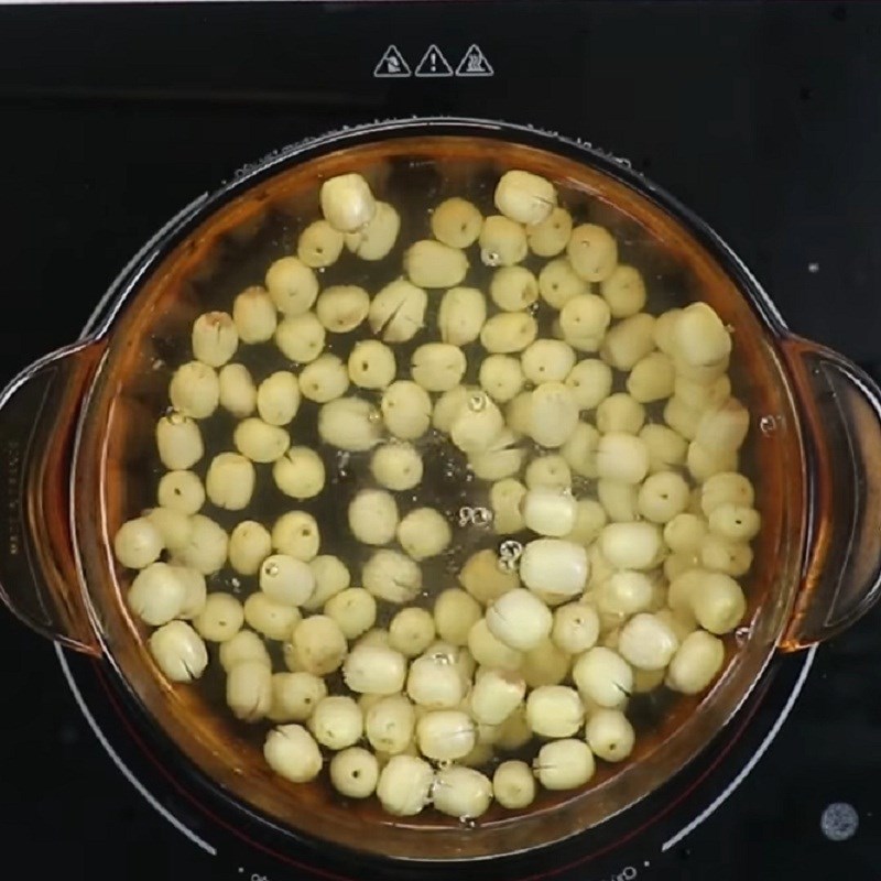 Step 1 Boil lotus seeds and water chestnuts Golden Lotus Tea