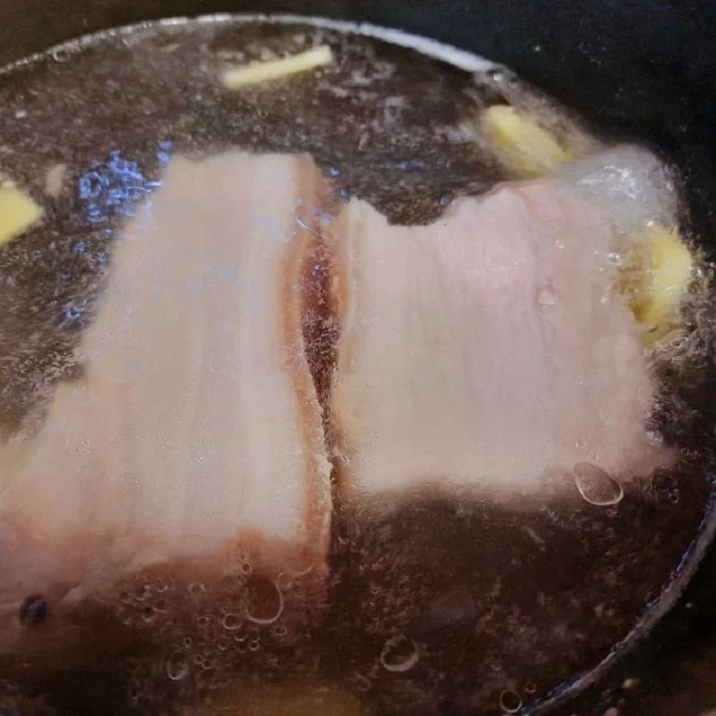 Step 2 Boil pork belly Sweet and sour pork belly