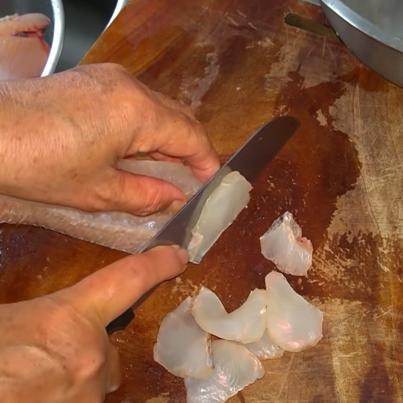 Step 1 Prepare snakehead fish for Quang noodles