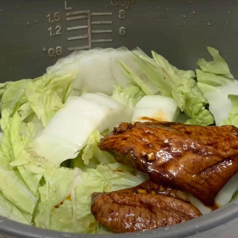Step 2 Cooking rice Chicken wings with soy sauce