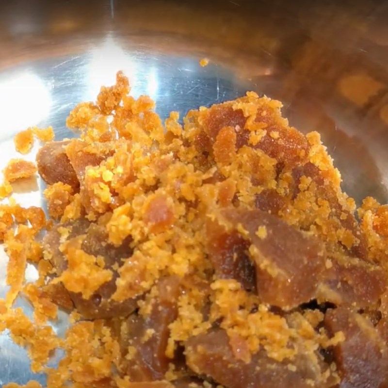 Step 1 Cook coconut sugar for Coconut Sugar Steamed Cake
