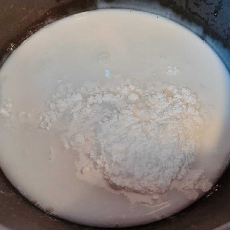 Step 4 Cooking coconut milk for dessert Black bean and mung bean dessert using a pressure cooker