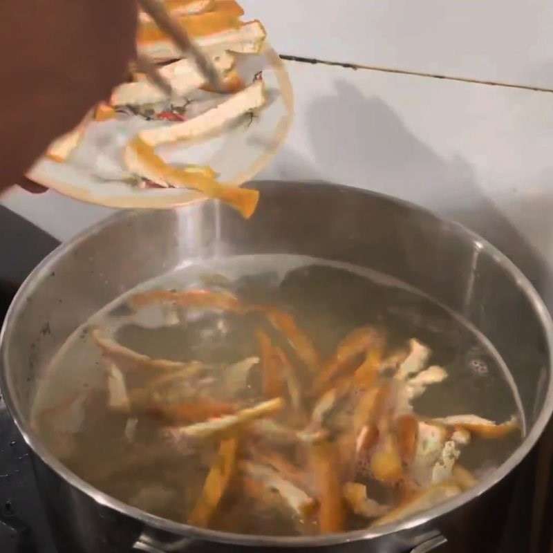 Step 4 Cooking the broth for Snakehead Fish Soup