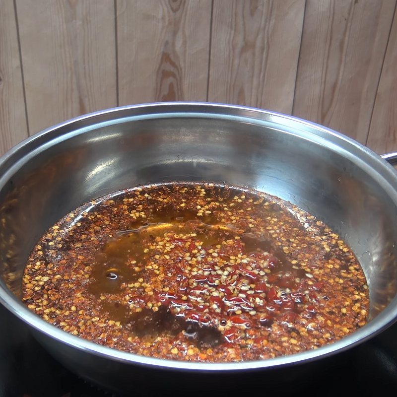 Step 2 Cook sweet fish sauce Mango soaked in sweet fish sauce with dried chili