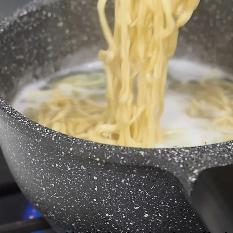Step 8 Cook the soy sauce and boil the noodles Tori Paitan Ramen