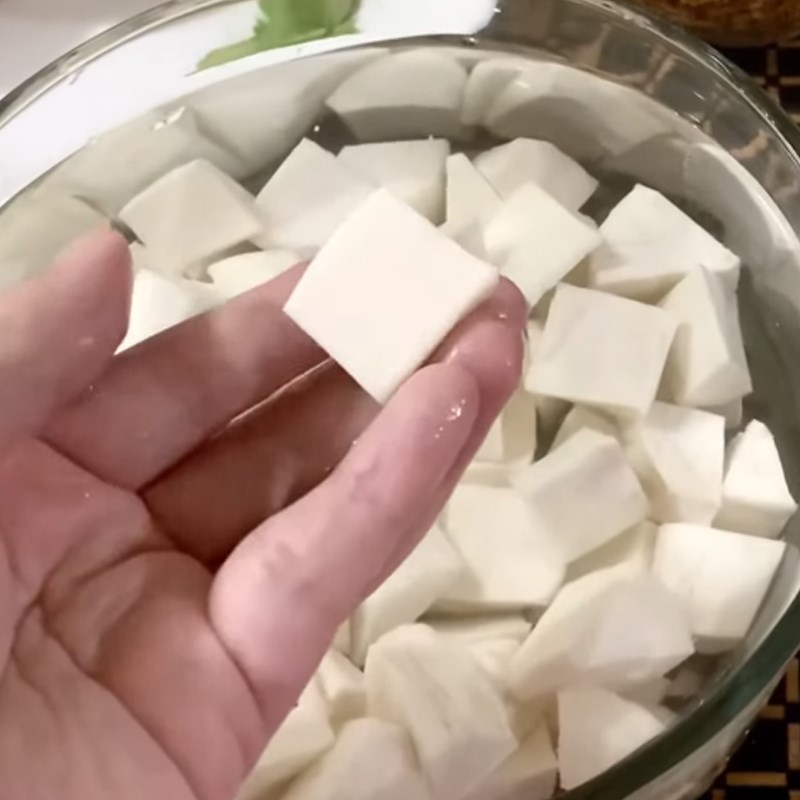 Step 1 Soak cassava and sticky rice for Xôi sắn using a pressure cooker
