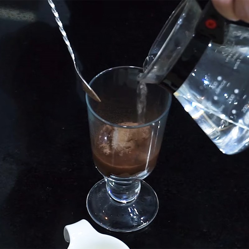 Step 1 Mix Milo Milo mixed with Coca-Cola