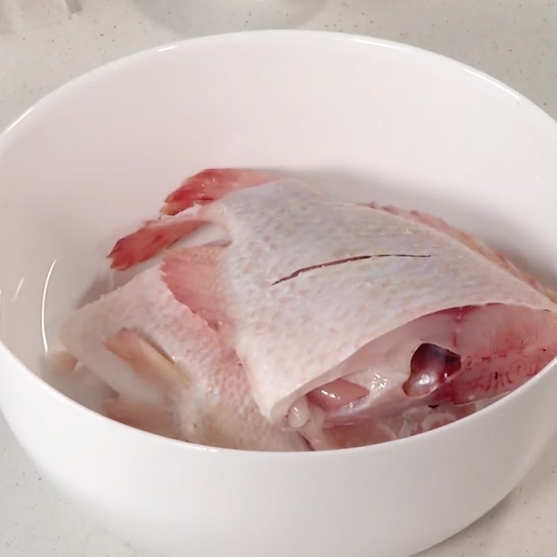 Step 1 Prepare the red tilapia Stewed red tilapia with fermented soybean