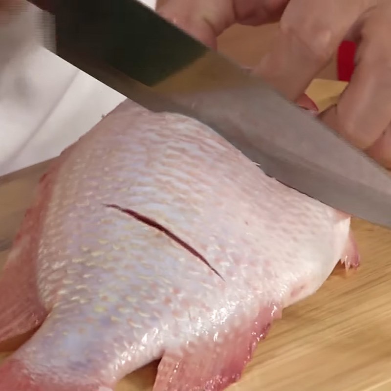 Step 1 Prepare the red tilapia Stewed red tilapia with fermented soybean