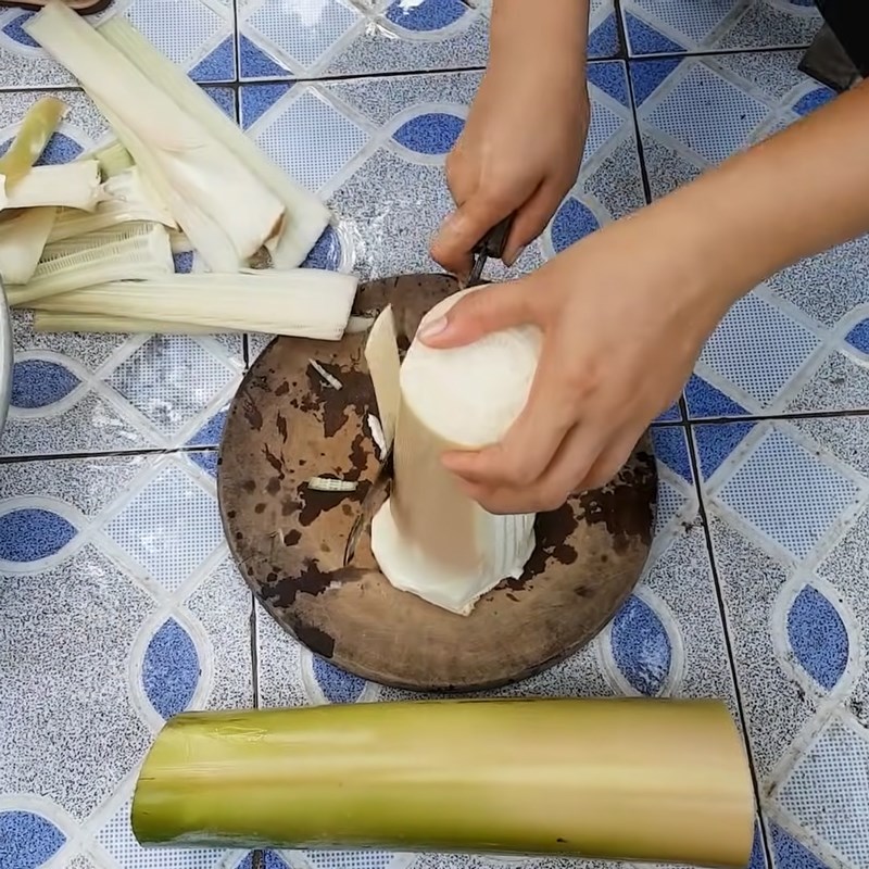 Step 1 Prepare the banana tree for Sour Soup with Dried Dory Fish and Grated Banana