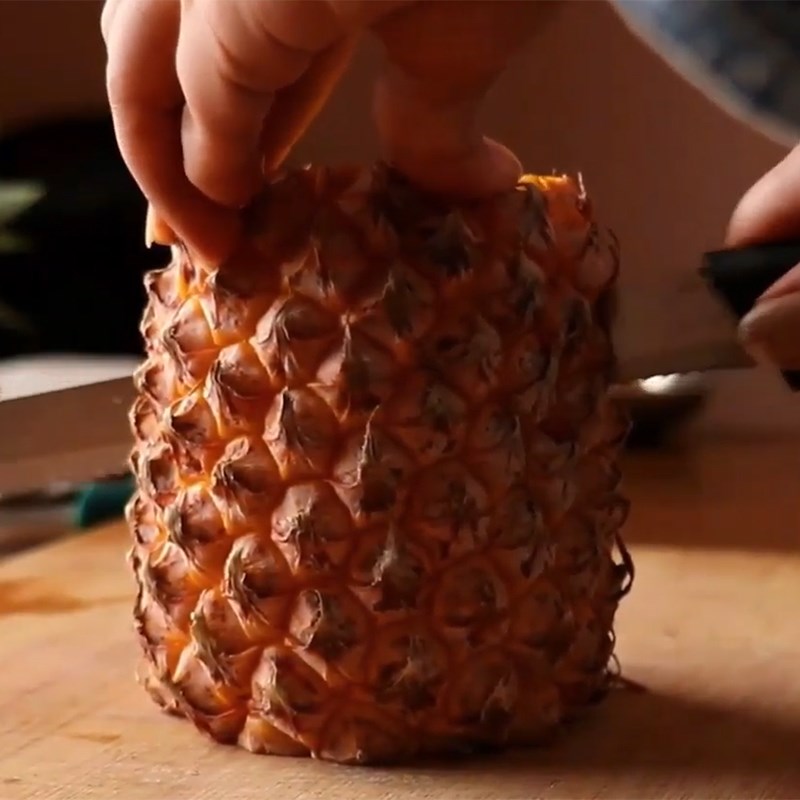Step 1 Prepare the pineapple for Pineapple Milk Ice Cream