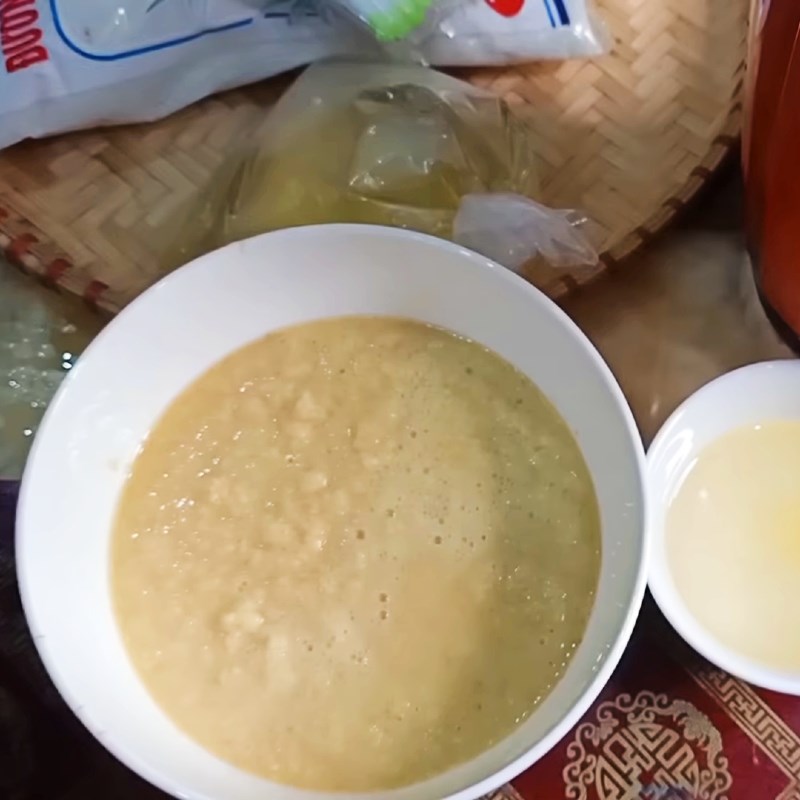Step 1 Prepare and grind the gac Gac sticky rice cake