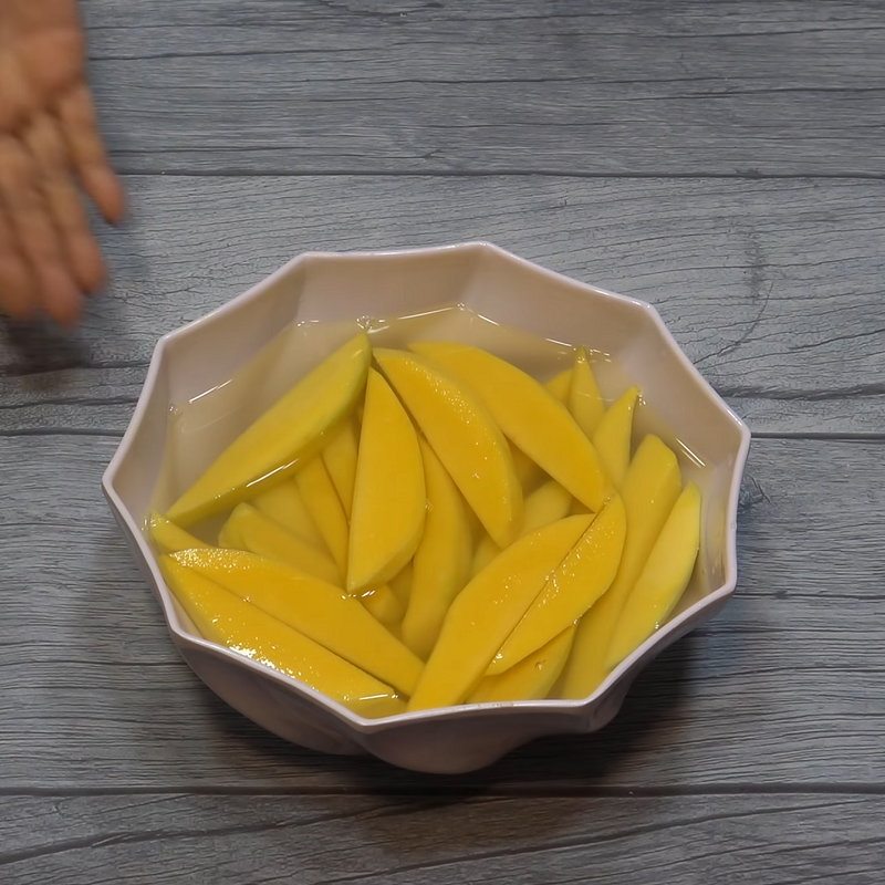 Step 1 Prepare the mango Pickled mango with sugar and dried chili