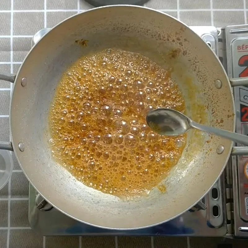 Step 1 Caramelizing sugar for green tea flan using agar powder