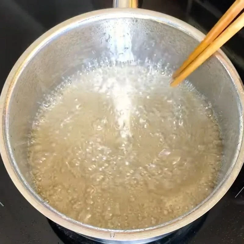Step 1 Caramelizing sugar for Green Tea Flan