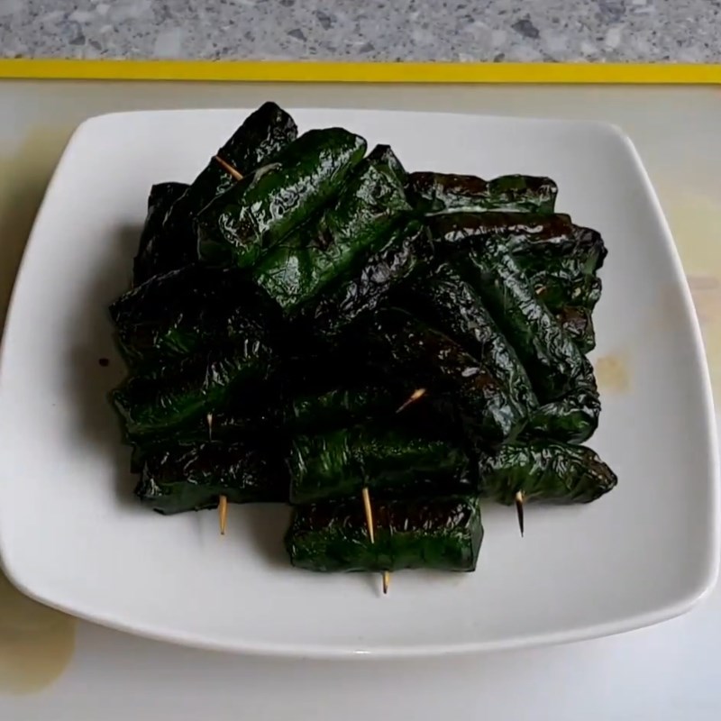 Step 7 Finished product Grilled frog meat wrapped in wild betel leaves