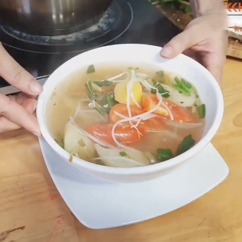 Step 4 Final product Sour soup with dried snakehead fish and shredded lotus stem