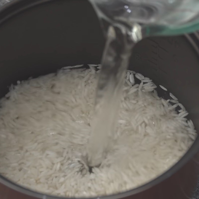 Step 1 Cooking rice Fried Squid Bento