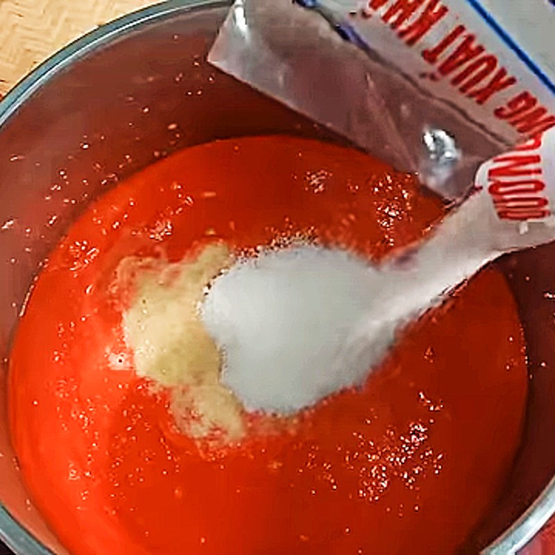 Step 2 Mixing and cooking the crushed gac mixture Gac lam dessert