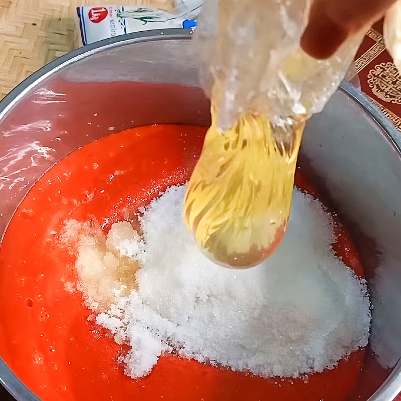 Step 2 Mixing and cooking the crushed gac mixture Gac lam dessert