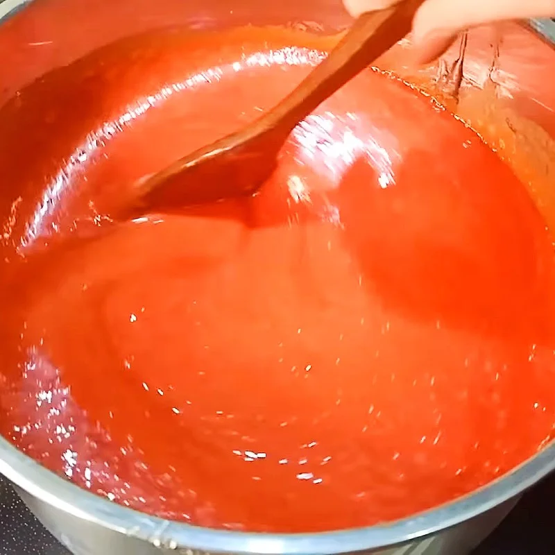 Step 2 Mixing and cooking the crushed gac mixture Gac lam dessert