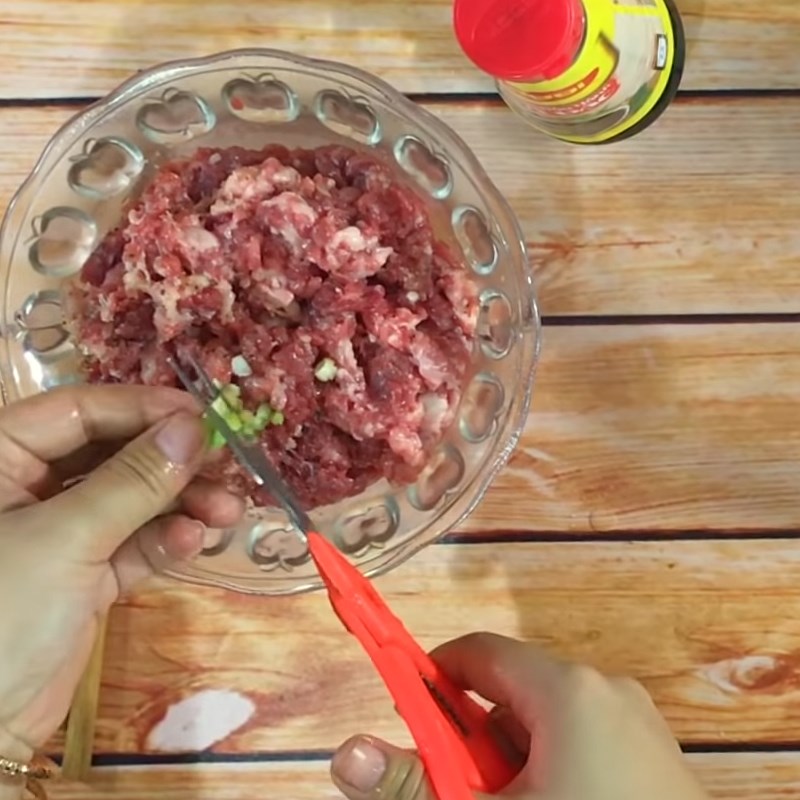 Step 1 Marinate the pork for Stuffed Bitter Melon with Soy Sauce