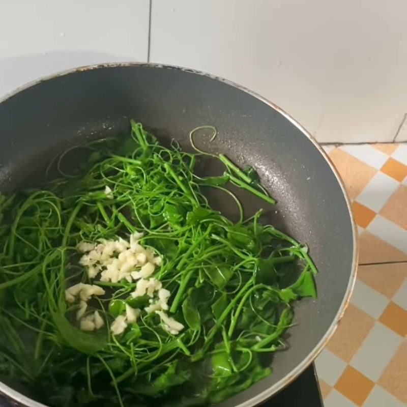Step 2 Sautéed water spinach with garlic