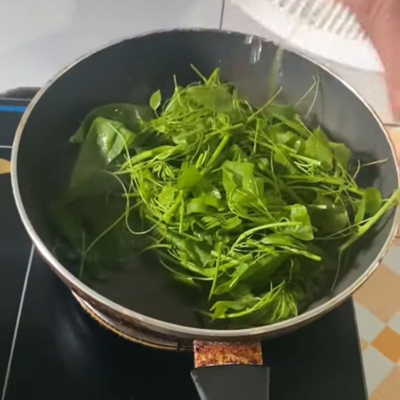 Step 2 Sautéed water spinach with garlic