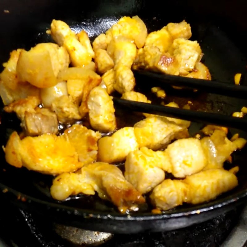 Step 2 Stir-fried meat Salted squid with pork belly