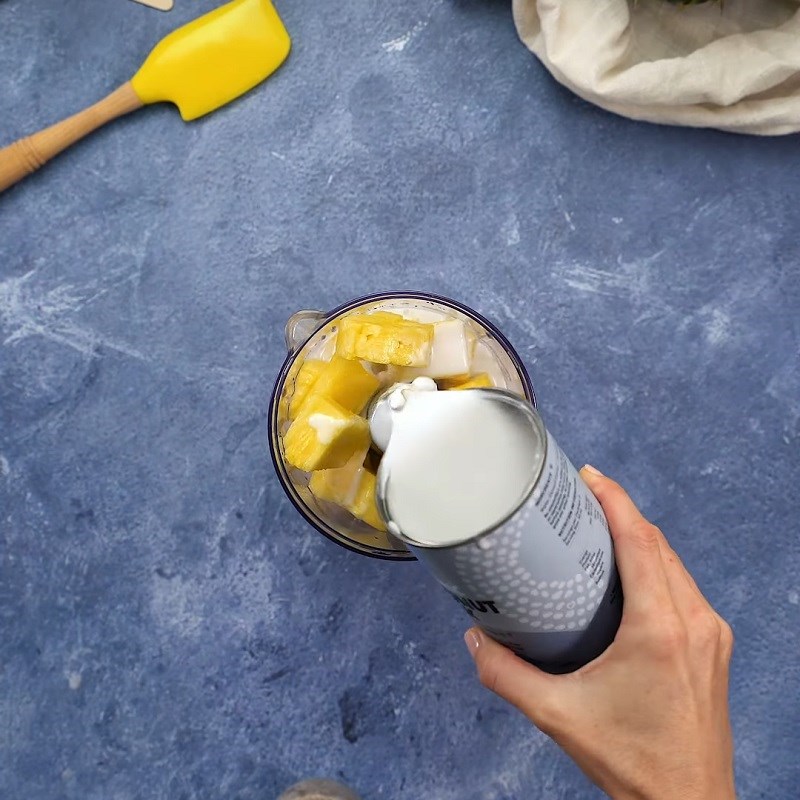 Step 2 Blend the coconut milk and pineapple mixture for Pineapple Ice Cream Bars