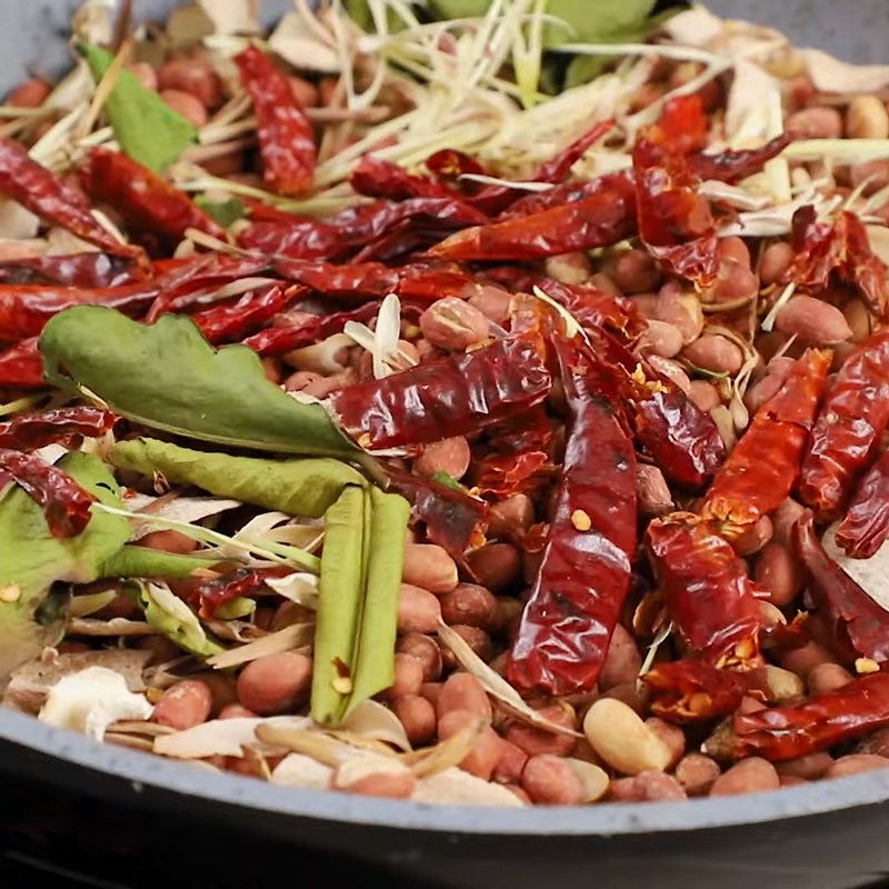 Step 4 Seasoning Thai style roasted peanuts with lemongrass and chili